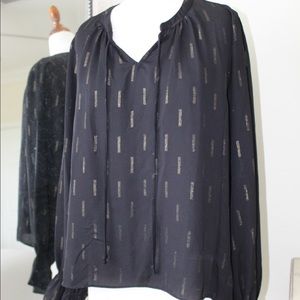 black long sleeve with great detail and gold